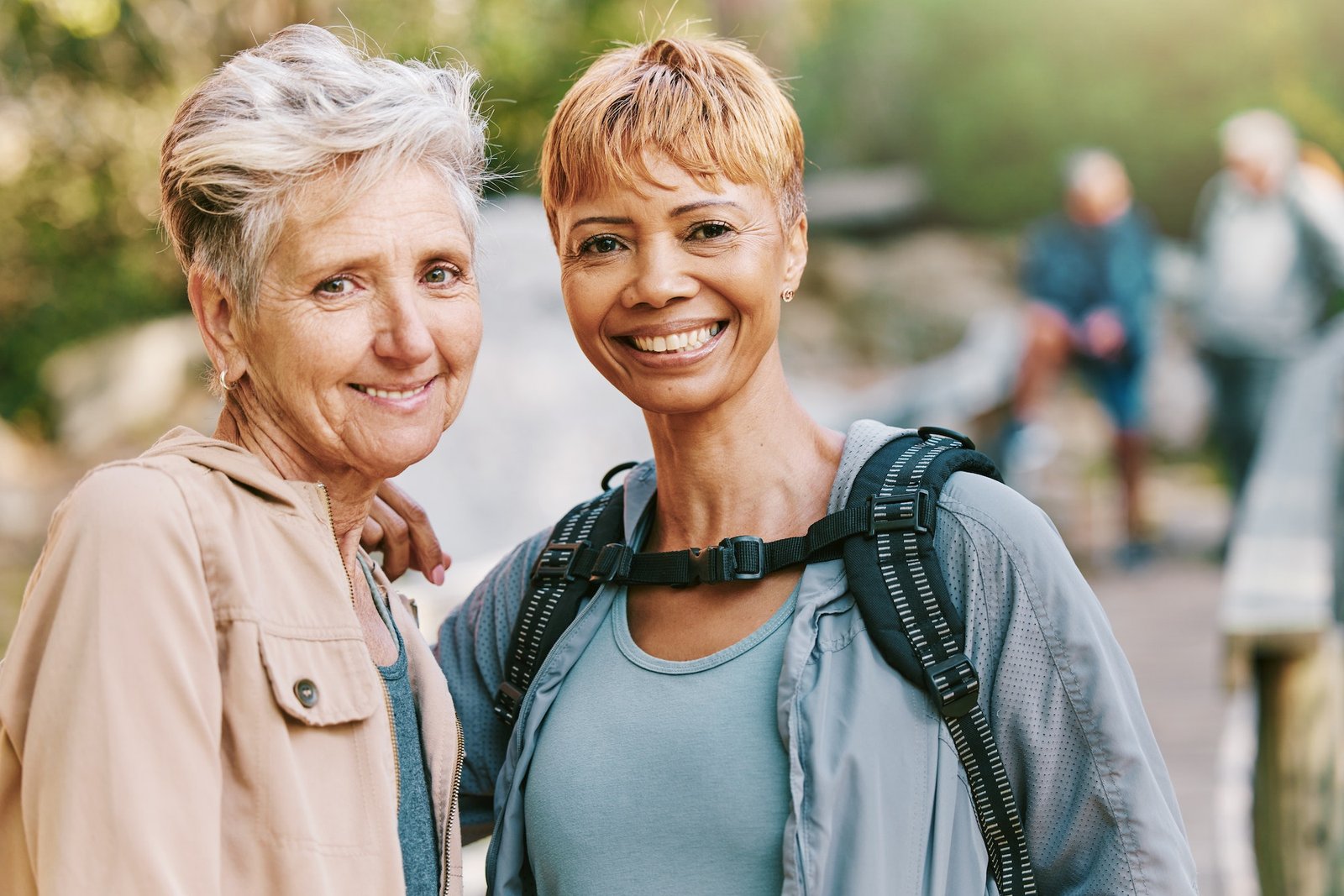 Elderly women, smile and hiking with fitness outdoor, trekking with friends and retirement, vitalit