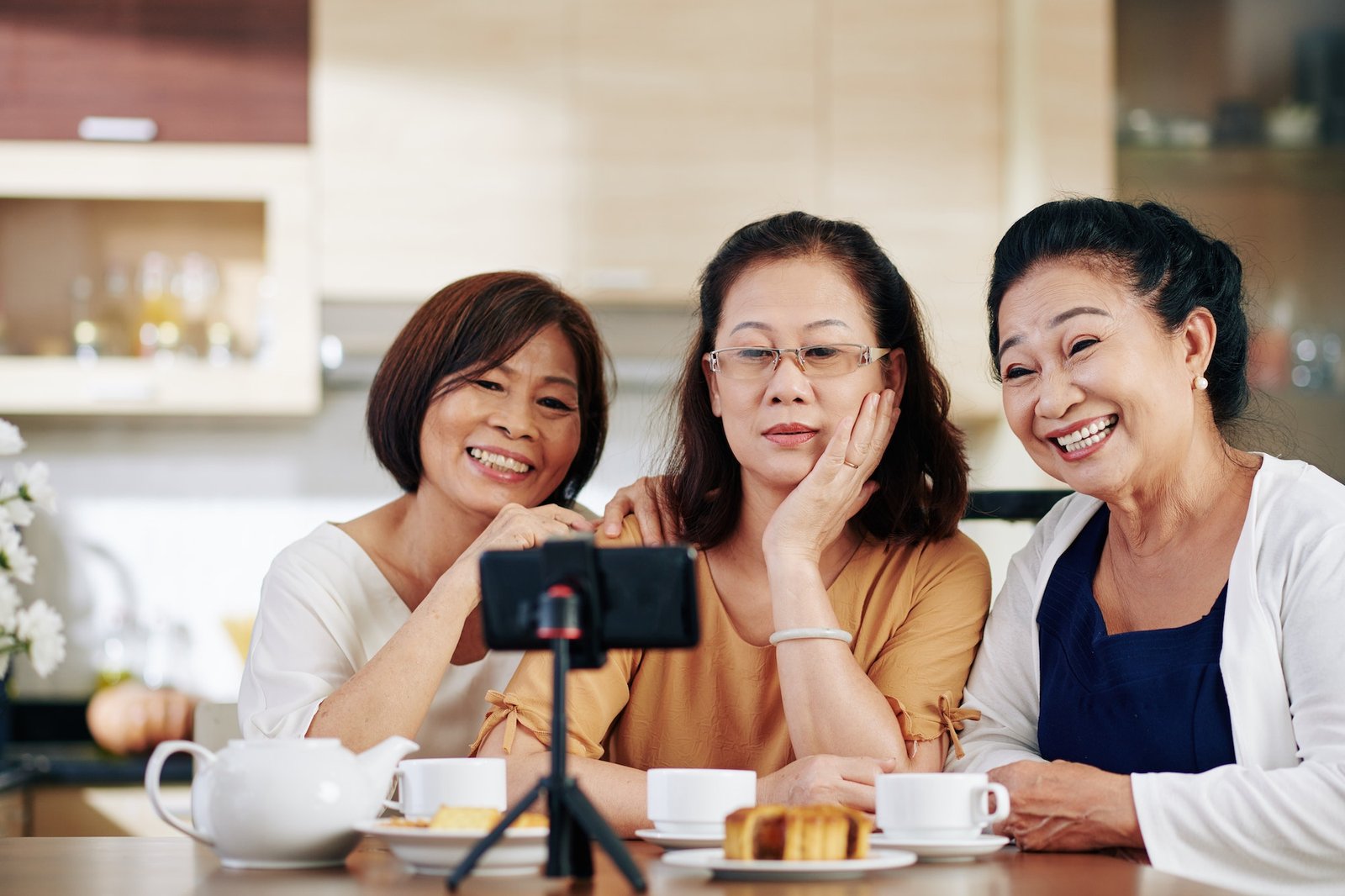 Elderly women talking selfie