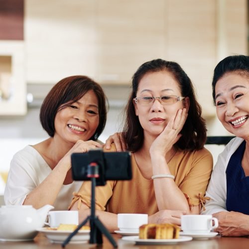 Elderly women talking selfie